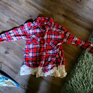 Plaid flannel button- up shirt with lace bottom.